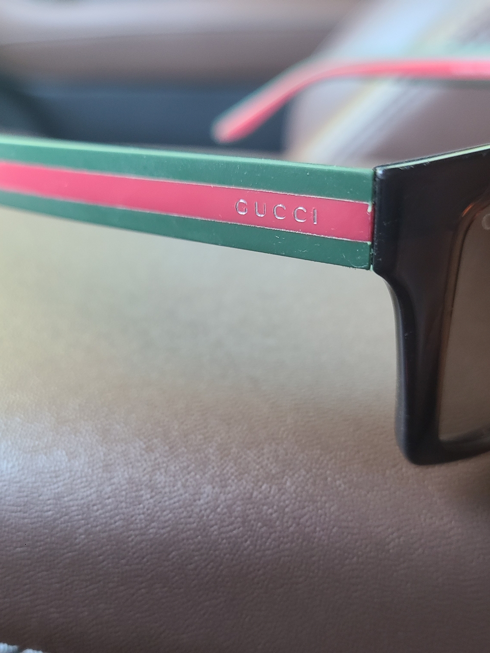 Gucci Men’s Black Sunglasses with Green and Red Accent
